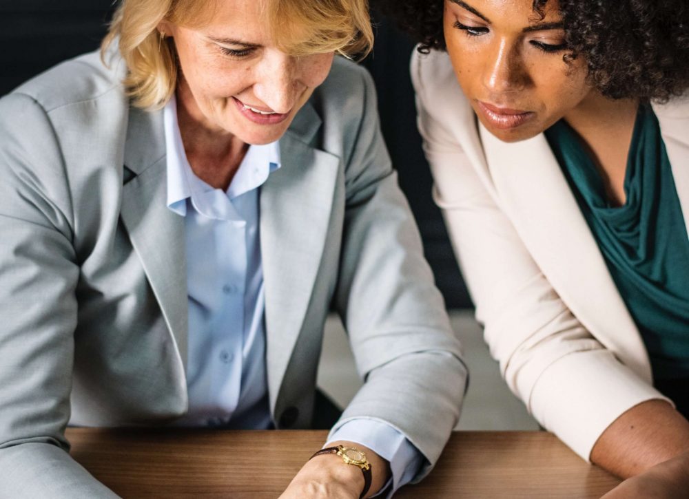 adults-blonde-business-people-1282167-1 Small Business Tax Preparation Services